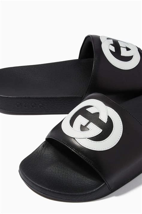 fake gucci leather slides|gucci interlocking slides.